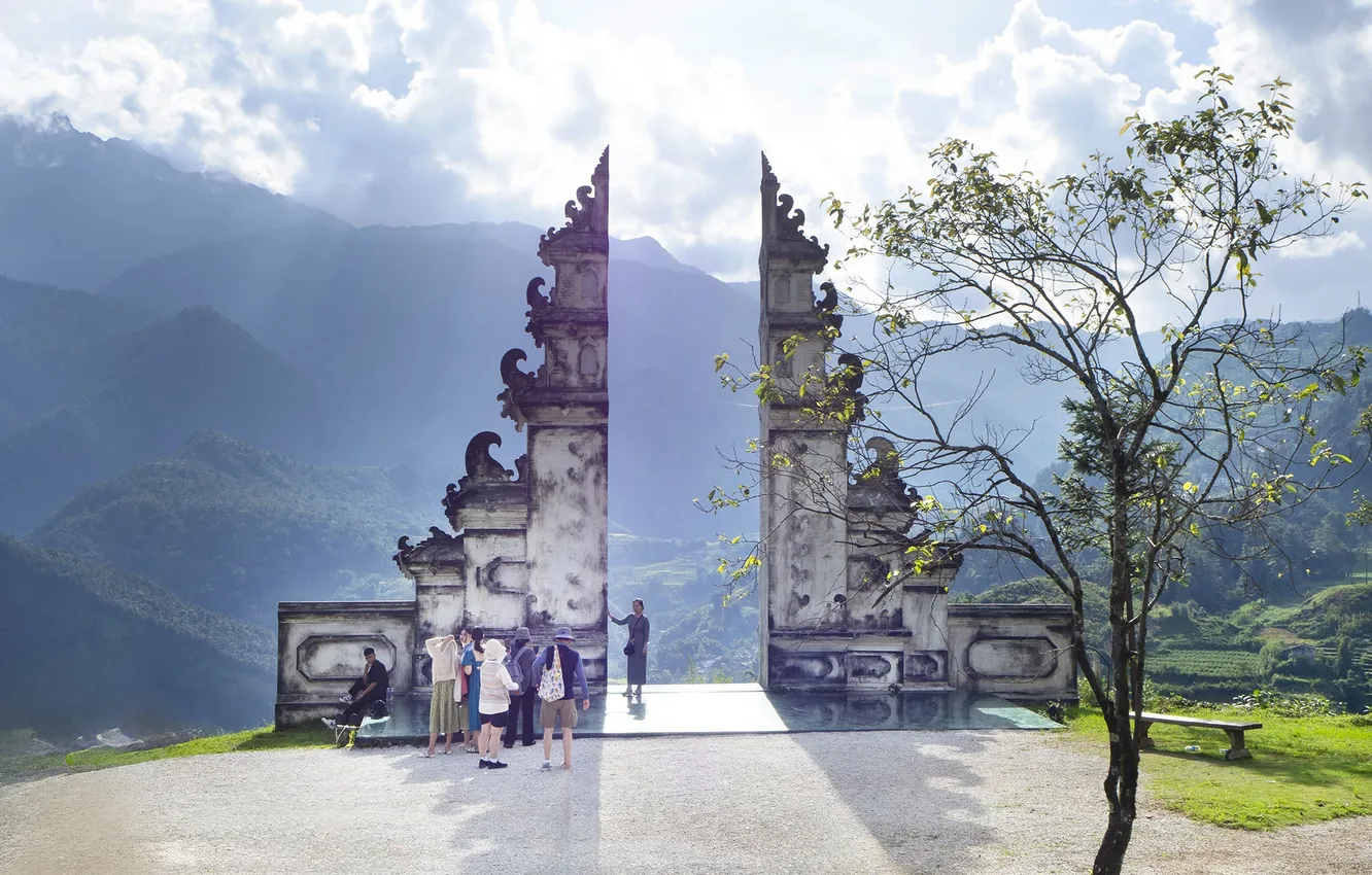 Photo wallpaper mountains, posts, people, structure