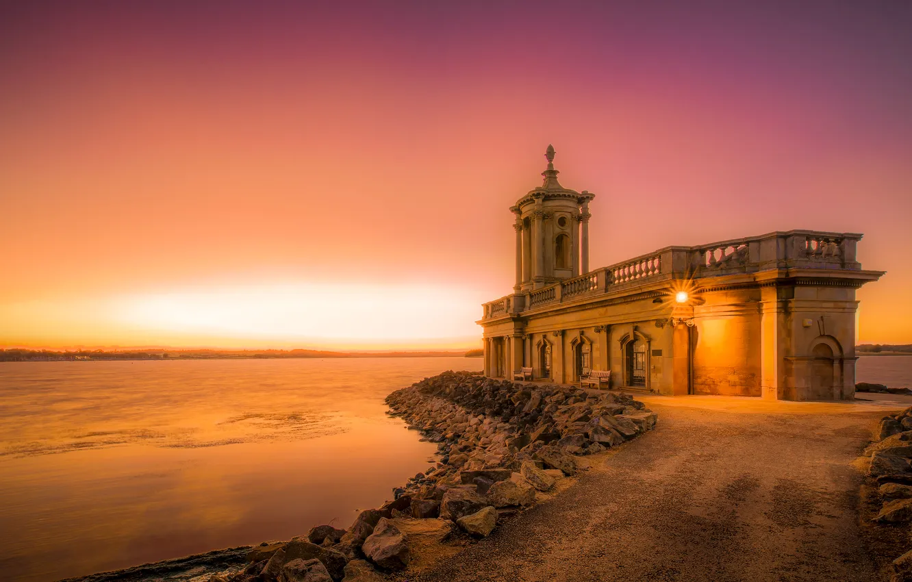 Photo wallpaper the sky, the sun, sunset, stones, castle, dawn, shore, architecture