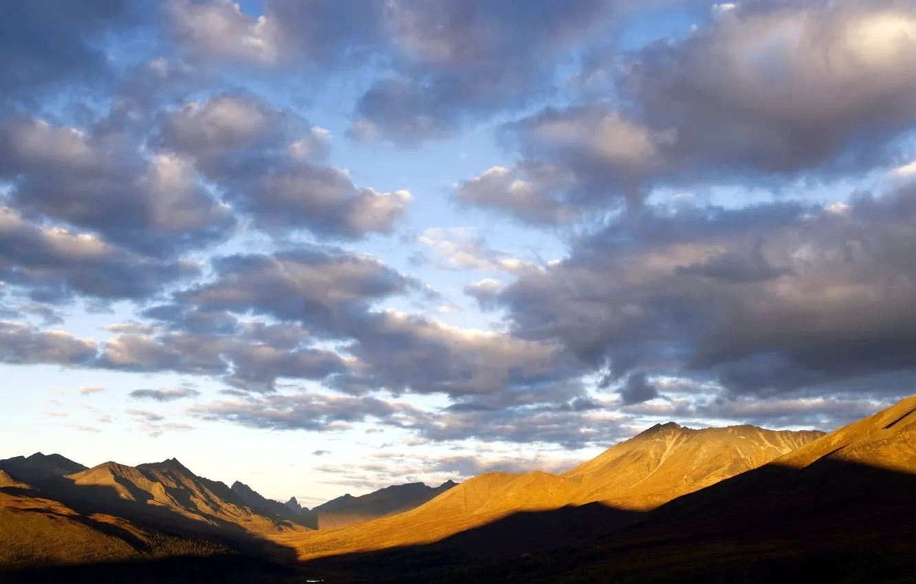 Photo wallpaper the sky, clouds, Tombstone Mountains, A Mountain of Tombstones, Tombstone
