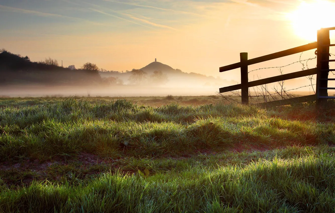 Photo wallpaper field, the sky, grass, the sun, light, fog, dawn, hills