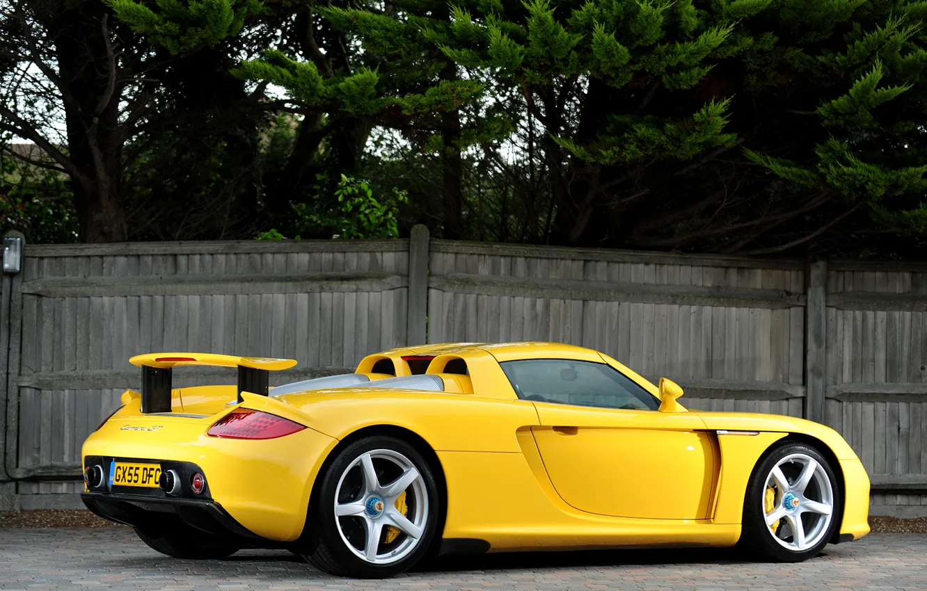 Photo wallpaper yellow, Porsche, supercar, Porsche, rear view, Carrera GT, Carrera GT