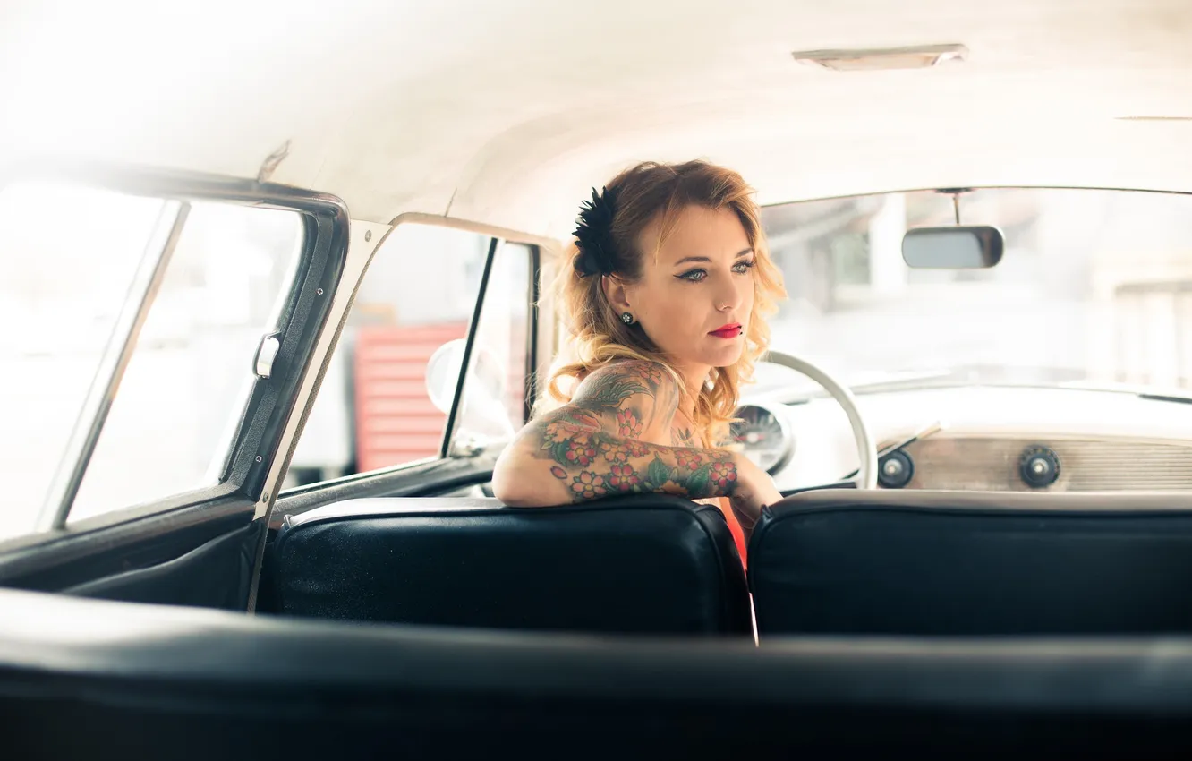 Photo wallpaper eyes, woman, interior, hands, lips, tattoo, car, solar