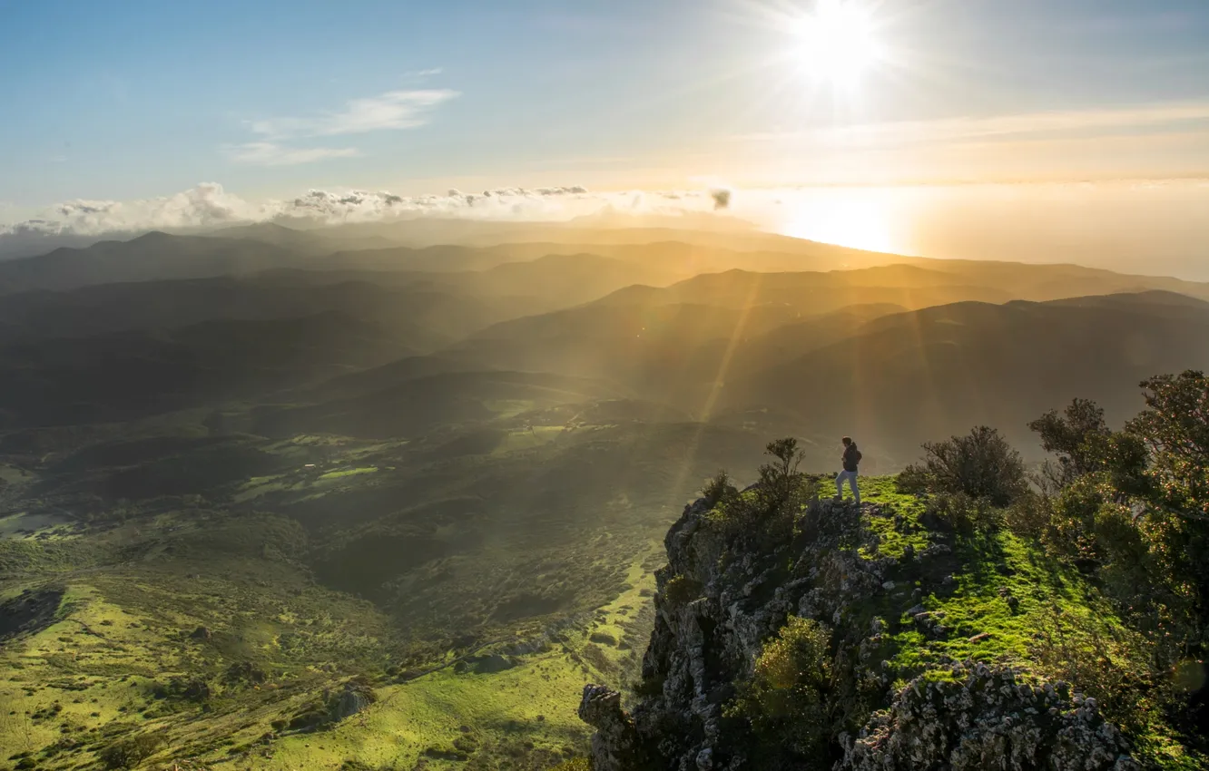 Photo wallpaper the sun, rays, mountains, open, rocks, dawn, hills, people
