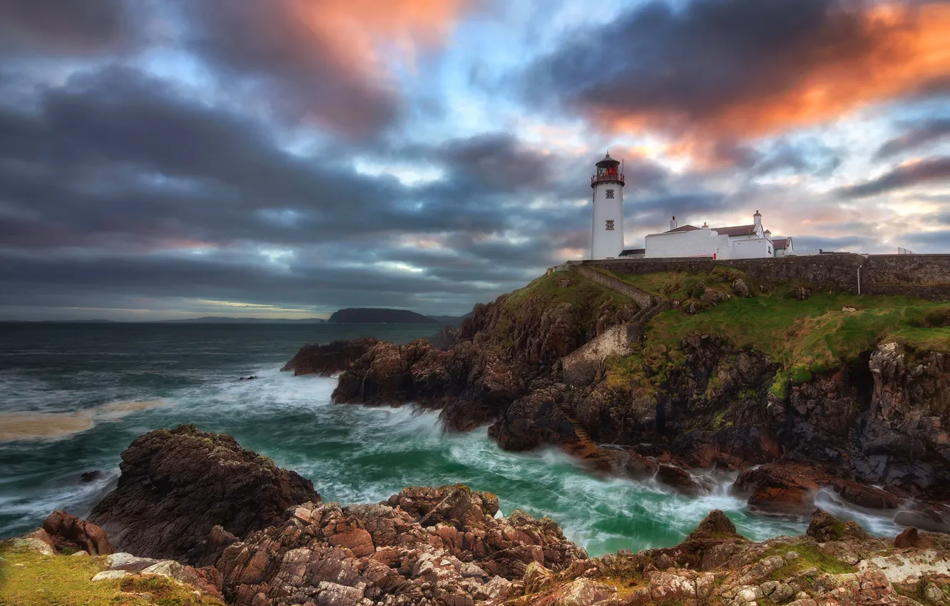 Photo wallpaper sea, clouds, rocks, lighthouse, shore, stones