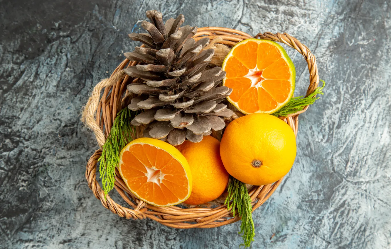 Photo wallpaper sprig, table, new year, orange, grey background, basket, needles, bumps